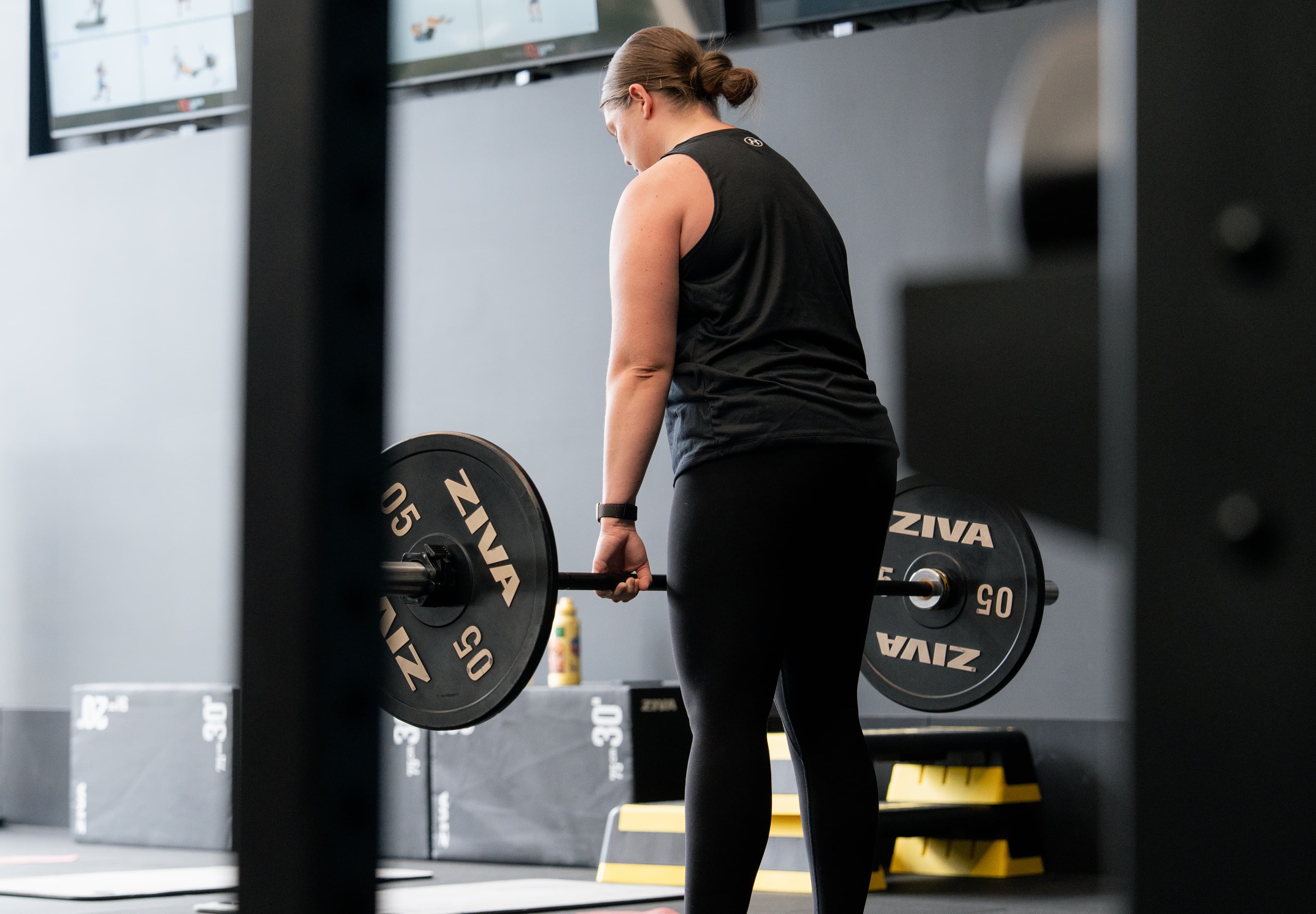 Exercise Physiologist coaching a member